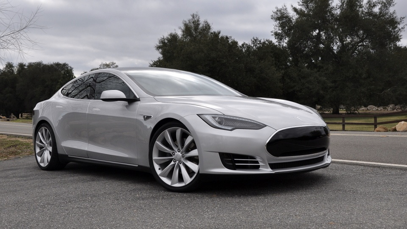 Illustration for article titled Tesla Model S "Alpha" shows off a sleeker electric ass